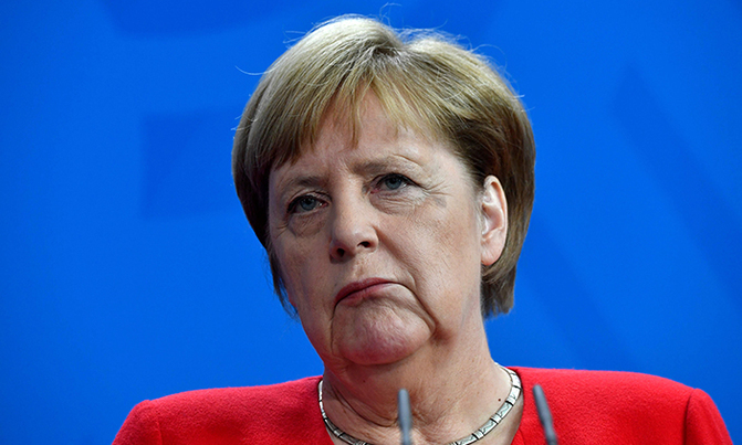 Merkel stays seated again after shaking spells Merkel stays seated again after shaking spells