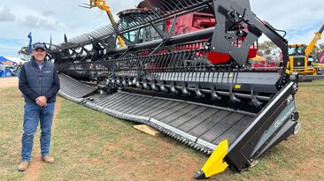 Gavin Branson, sales manager and product technical support with Waringa Distribution in South Australia, pictured alongside the Australian release of Geringhoff’s new 15.2m front with flexible frame and cutterbar.