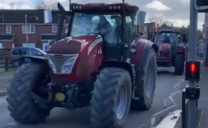 Around 30 tractors and 20 pick-ups protested outside the office of Rural Affairs Minister Lesley Griffiths on Monday (February 12)