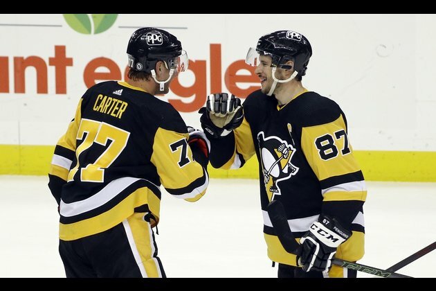NHL roundup: Jeff Carter nets 4 goals as Pens grab East lead