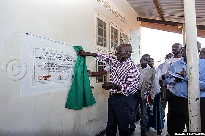 lex akooza ermanent ecretary for inistry of duction and ports launching a classroom block at aluda econdary chool in alabek efugee ettlement amwo istrictorthern gandahoto by ajarah alwadda 