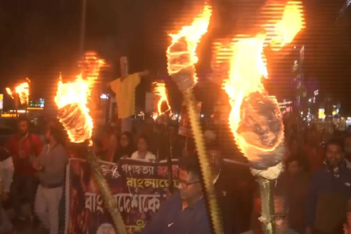 West Bengal: BJP workers hold torchlight rally in Siliguri against atrocities on Hindus in Bangladesh