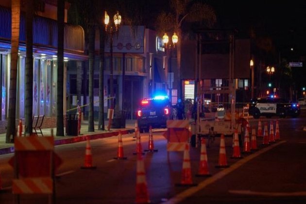 Police surround male Asian suspect in mass shooting near Los Angeles that left 10 dead