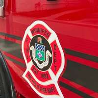 1 sent to hospital after vehicle fire burns about 2 hectares in Winnipeg