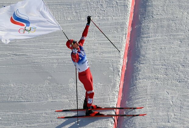 Russian team win first Beijing gold