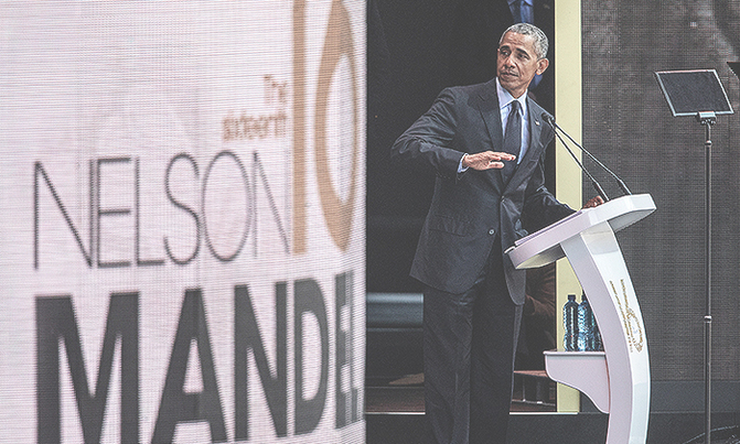 Obama warns of 'strange and uncertain times' in Mandela tribute Obama warns of 'strange and uncertain times' in Mandela tribute
