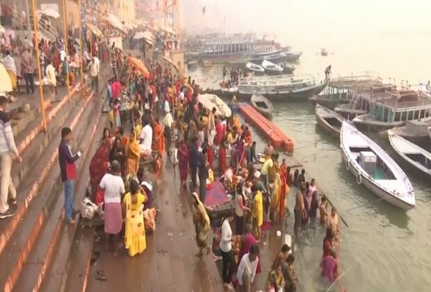 Varanasi: Devotees take holy dip in river Ganga on the occasion of 'Ekadashi'