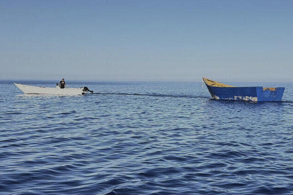 Two dead, dozens missing after migrant boat capsizes in Mediterranean