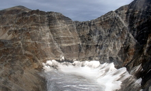 Proterozoic pegmatite swarm in the headwall of the cirque of a small mountain glacier, northeastern Baffin Island, Nunavut Credit: Mike Beauregard