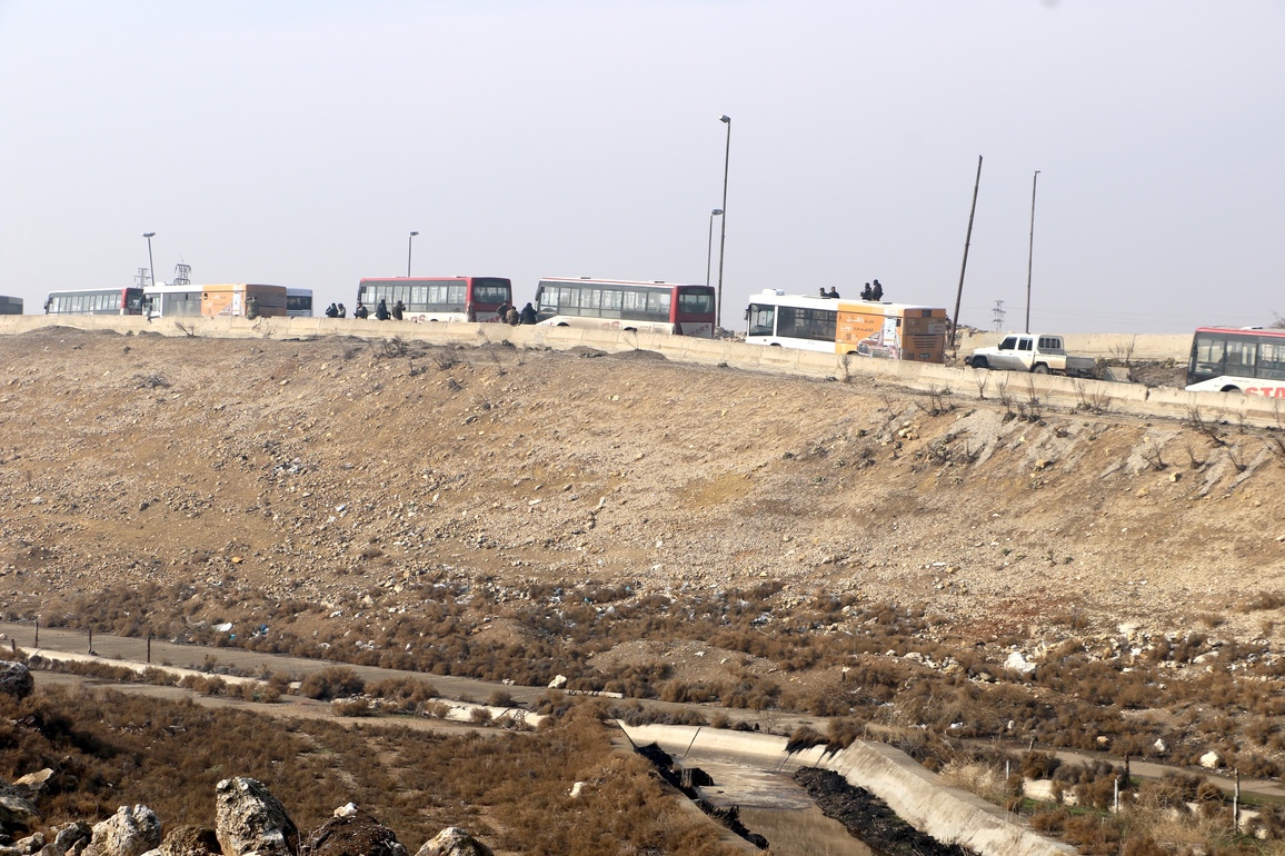 SYRIA-ALEPPO-SDF-EVACUATION BUSES-TENSIONS
