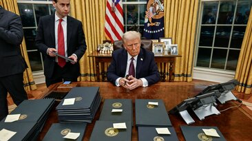 US President Donald Trump signing executive orders