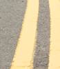 Nine inch double yellow lines painted on London street
