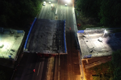 Watch an 800-tonne bridge glide slowly along the M53