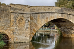 Historic bridge re-opens despite new defect 